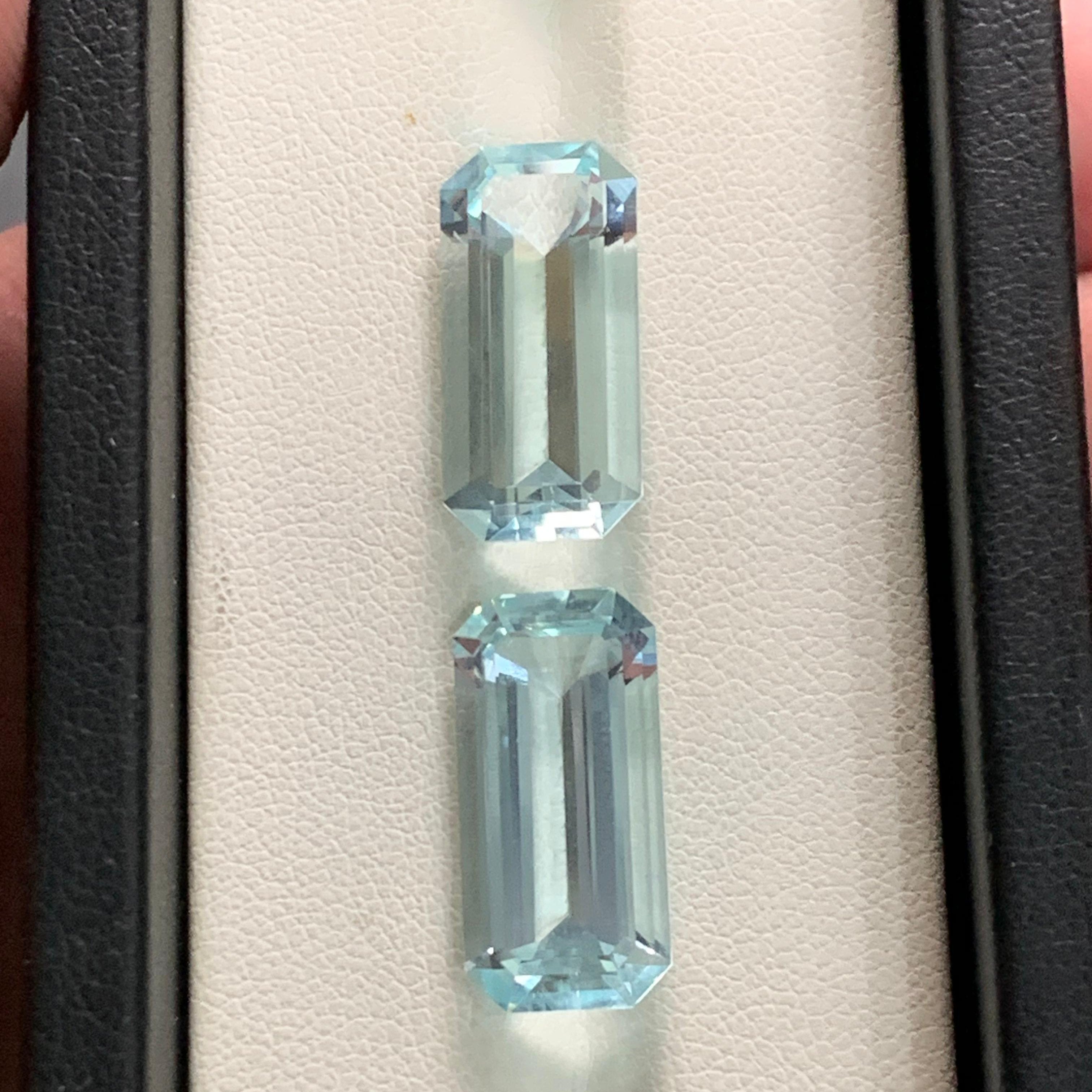 Pair of 16 carats Emerald Cut Blue Aquamarine Stone Pair