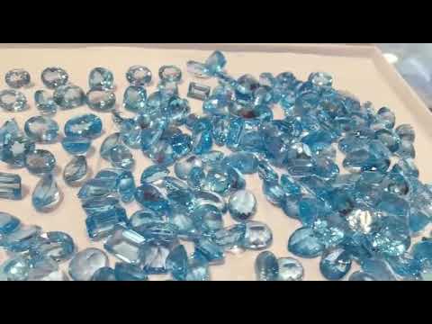 faceted blue topaz gems