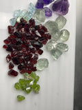 Mixed parcel of Raw Facet Grade Stones