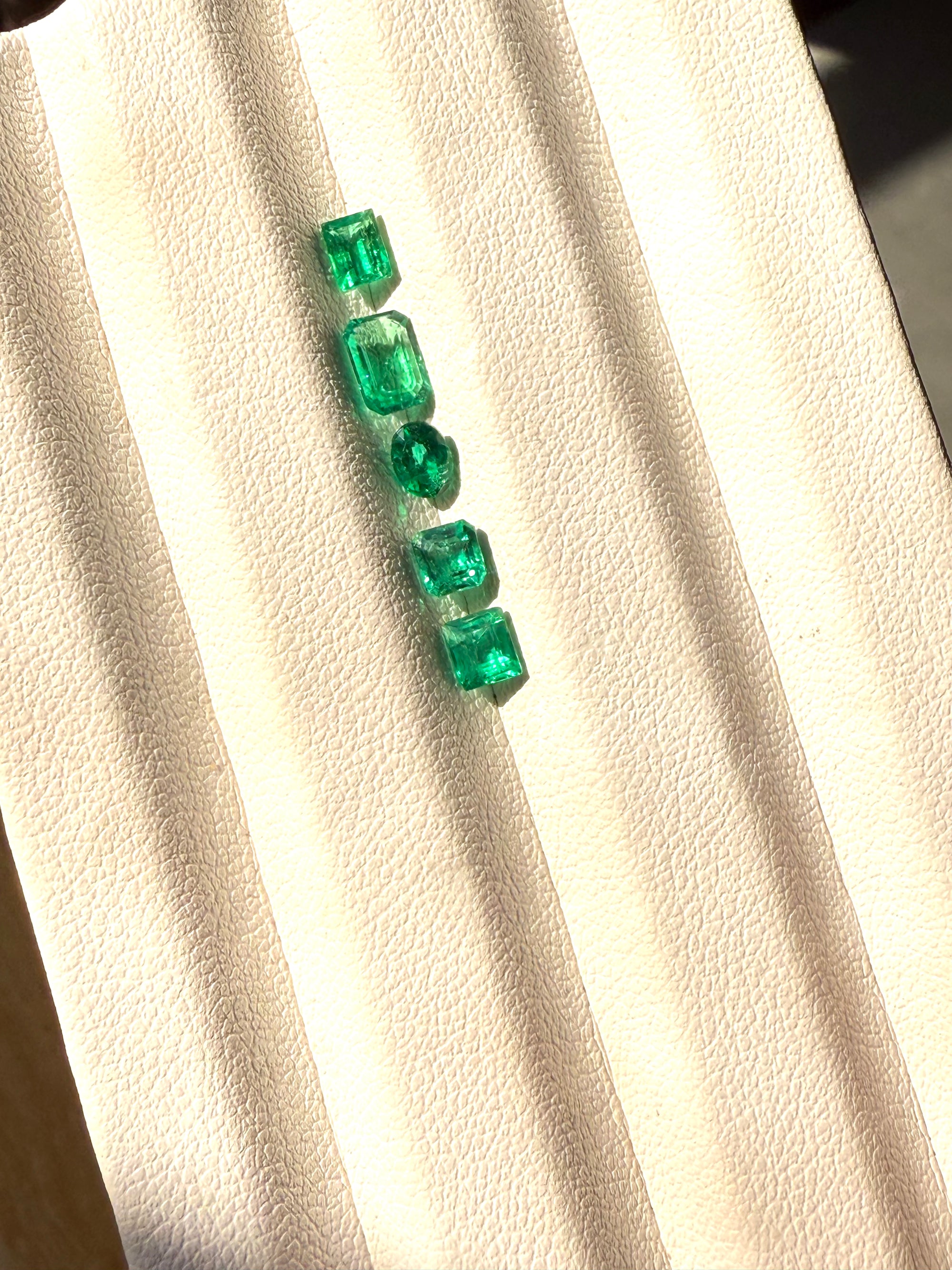 1.54 carats Vivid Green Emeralds- Step Cut, Princes, Cushion Cut