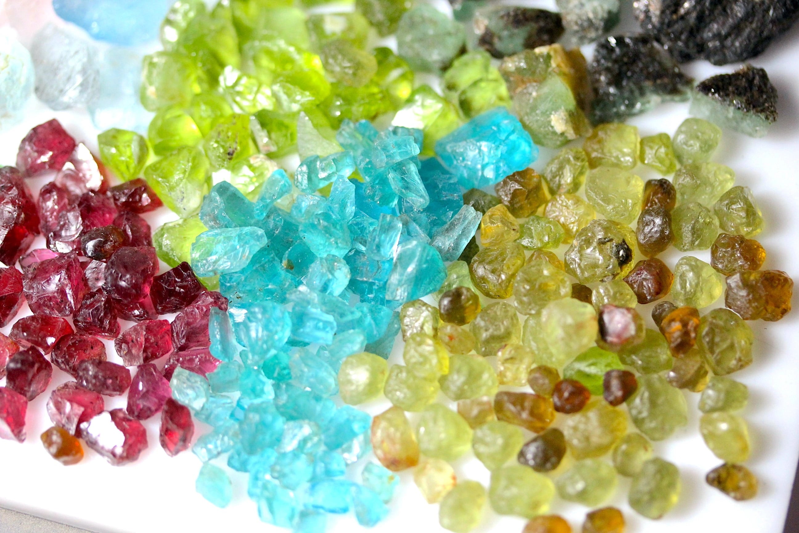 Check out the beauty of rough rhodolite garnet, apatite, mali garnet and peridot stones 