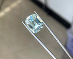 7.9 carats Blue Aquamarine Loose Gemstone with Emerald Cut showing brilliant color and clarity