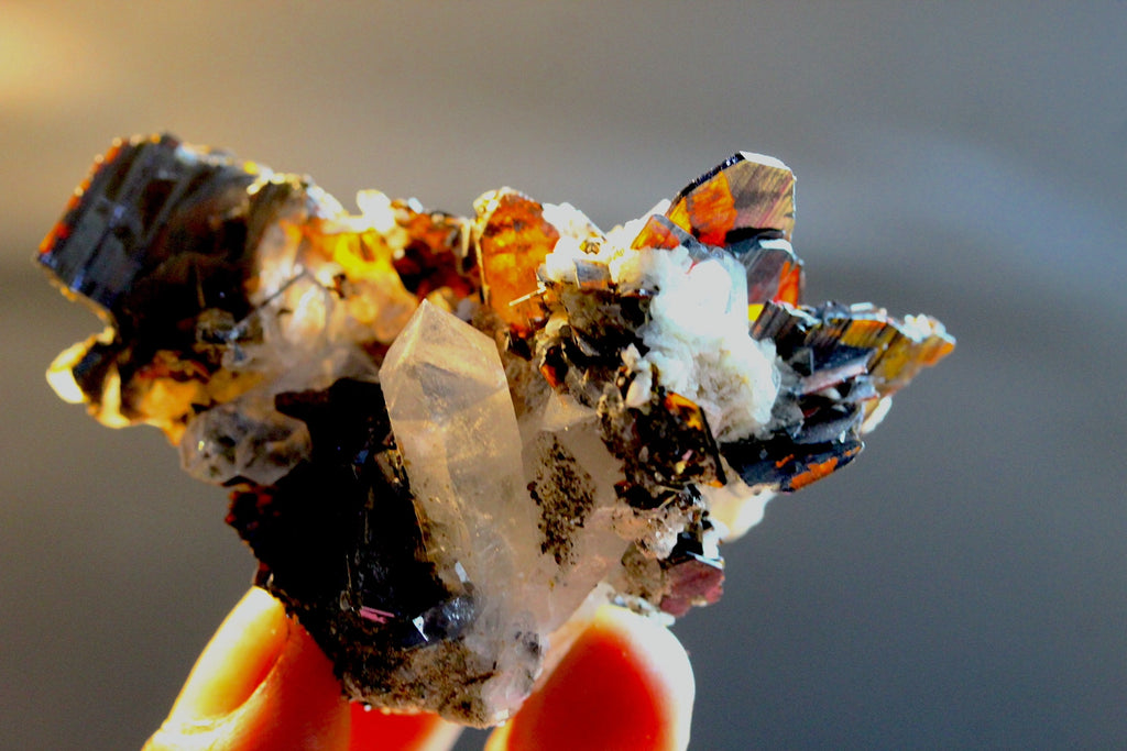natural mineral crystal cluster featuring brookite and quartz crystals