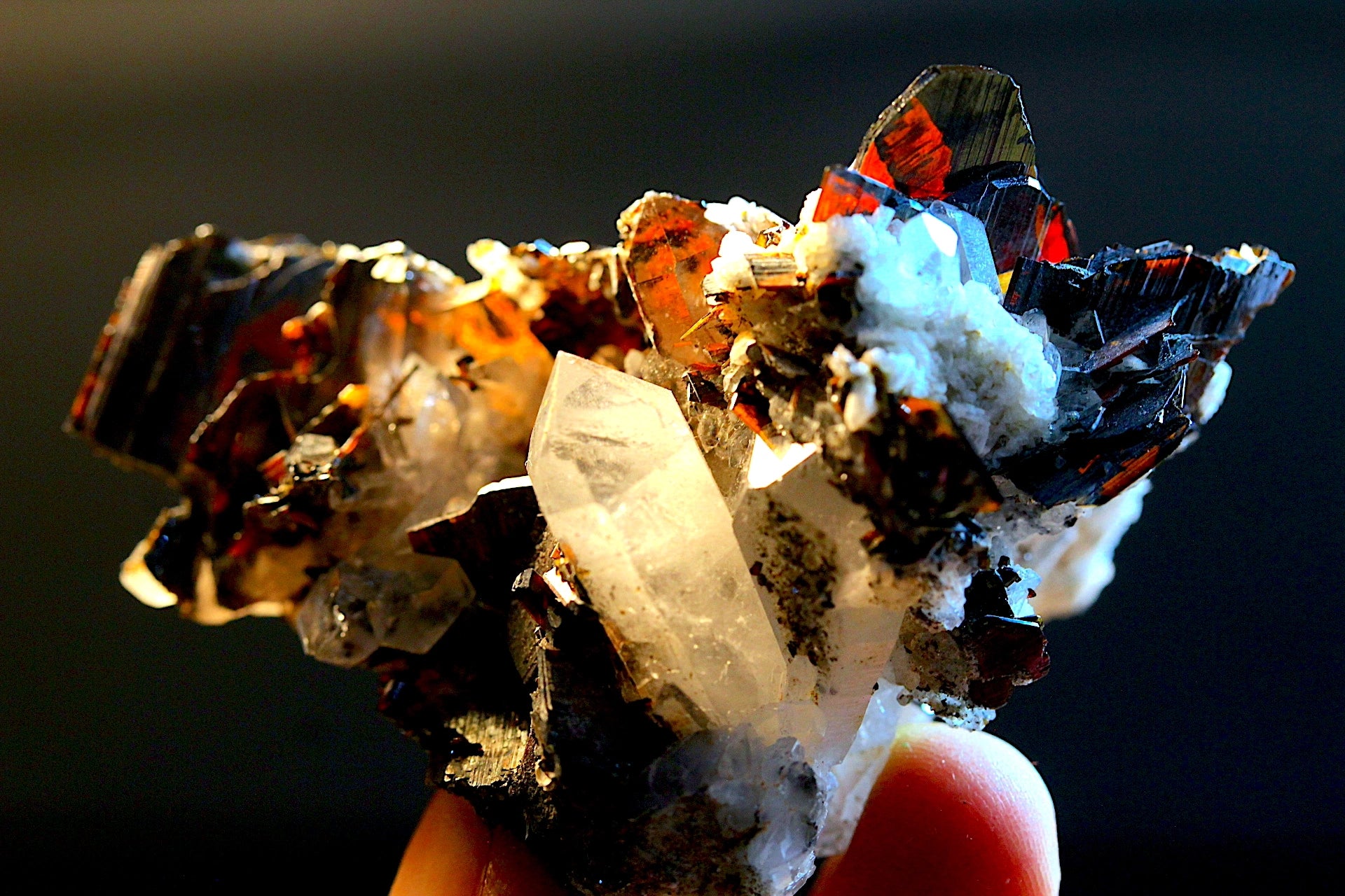 A close-up of a rare brookite crystal with quartz mineral specimen
