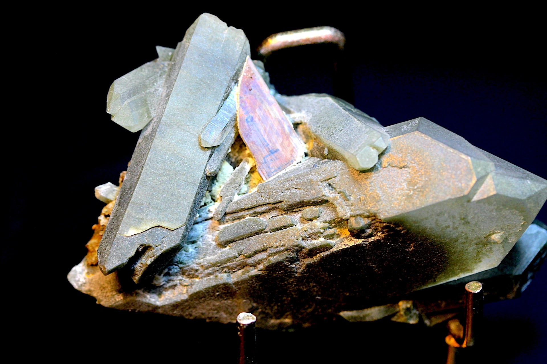 A close-up of a mineral specimen Chlorite Quartz with Brookite on Matrix 
