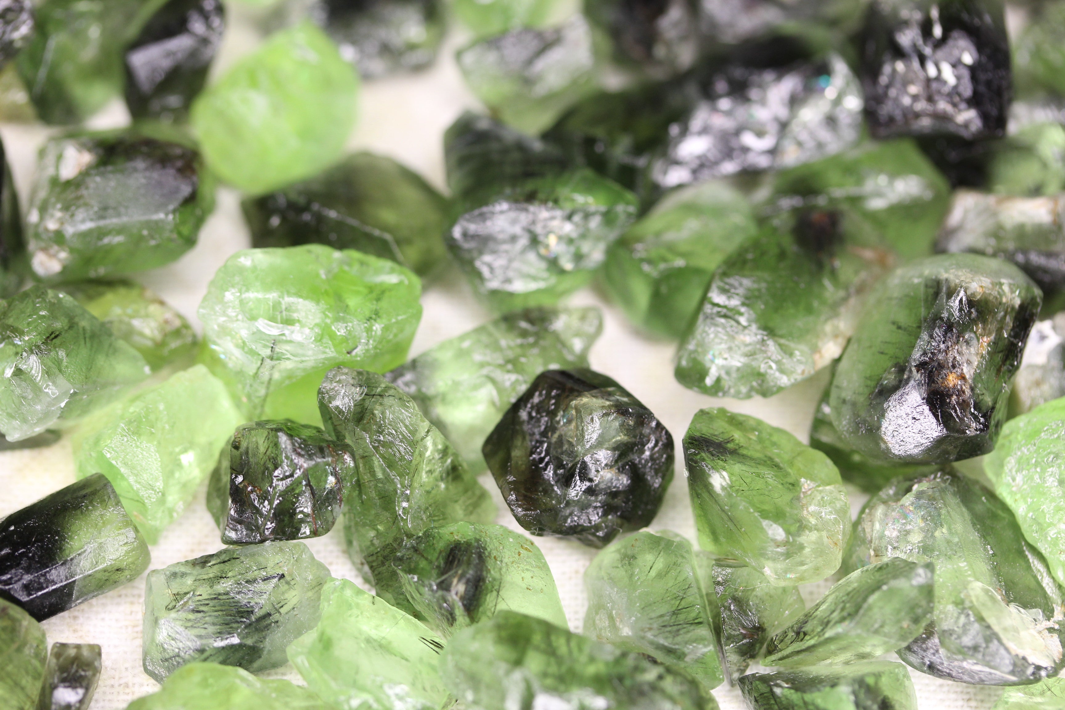 100 grams / 500 carats Natural Raw Peridots with Ludwigite Inclusions