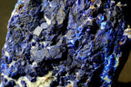 Close-up of a blue and black mineral specimen lazurite