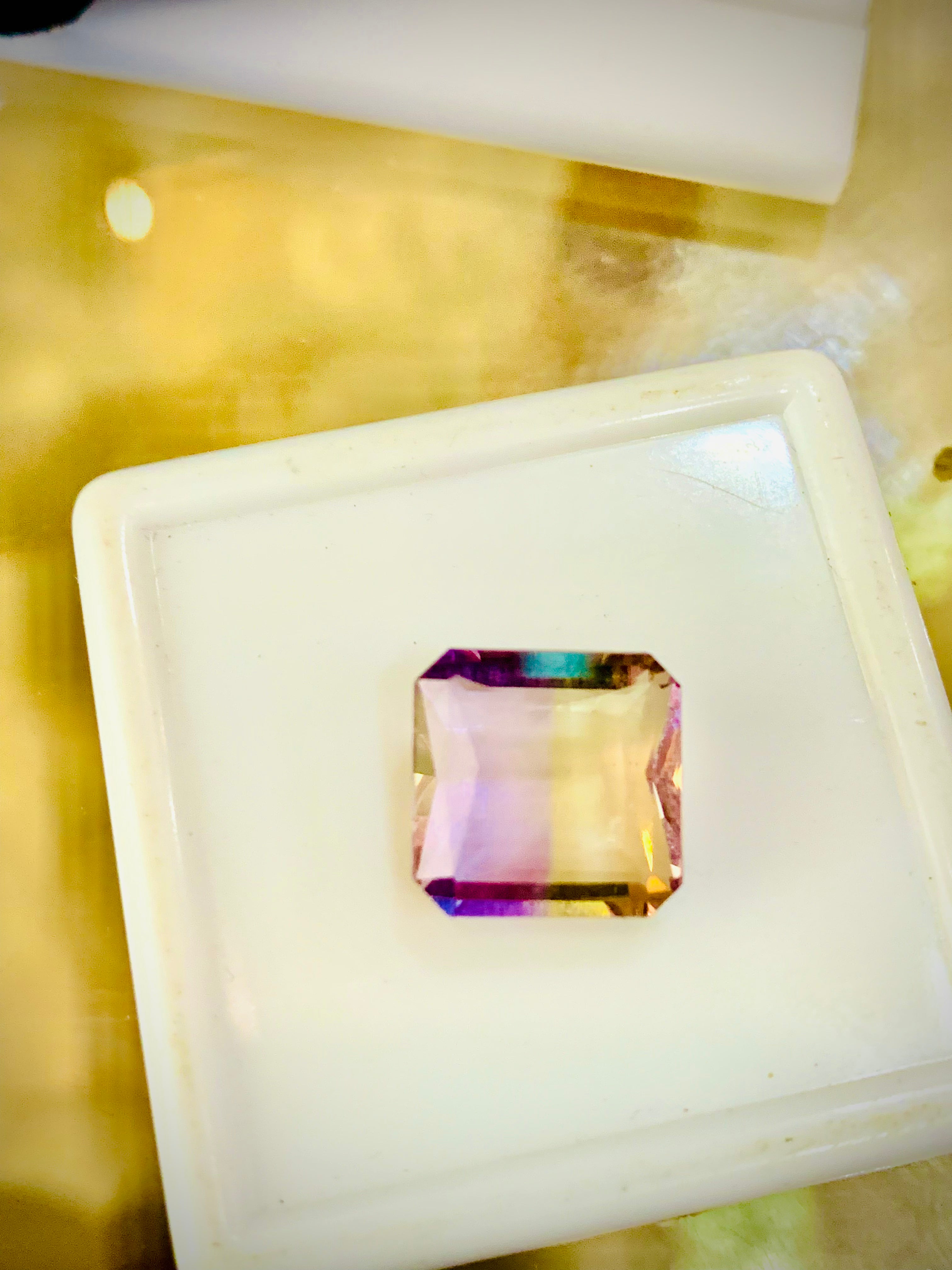 you may like this ametrine stone.