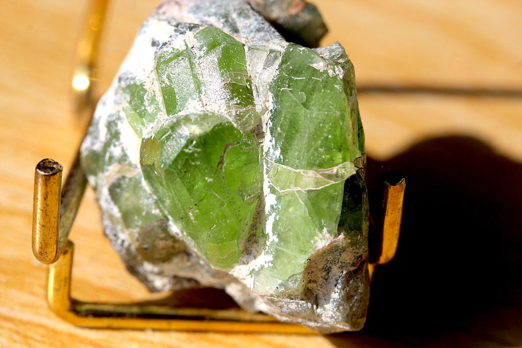 Close up of Peridot Specimen Crystal on Feldspar