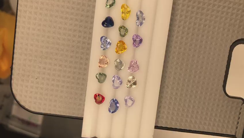 14.6 carats Orange, Pink, Blue Sapphires Heart Shape