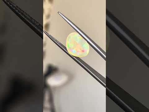 3.6 carats Oval Ethiopian Opal Cabochon